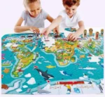 ⁦لعبة بازل خريطة العالم 2 في 1 مكونة من 100 قطعة مع 4 شخصيات⁩ - الصورة ⁦3⁩