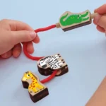 خطواتي الأولى: شك الحيوانات الخشبية من SES Creative